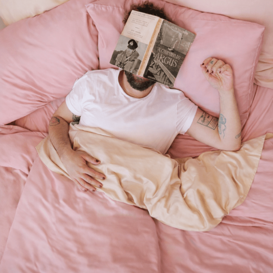 Detailed view of slightly wrinkled pink bamboo fabric, showcasing its natural, relaxed finish.