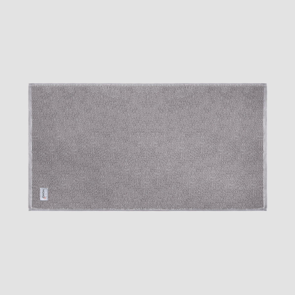 Tapete de banho grey em bambu da Momo Cotton – suave, absorvente, seca rapidamente e sustentável.